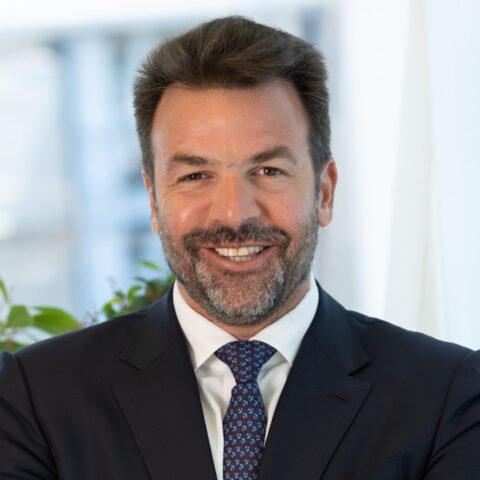 Man in suit smiling