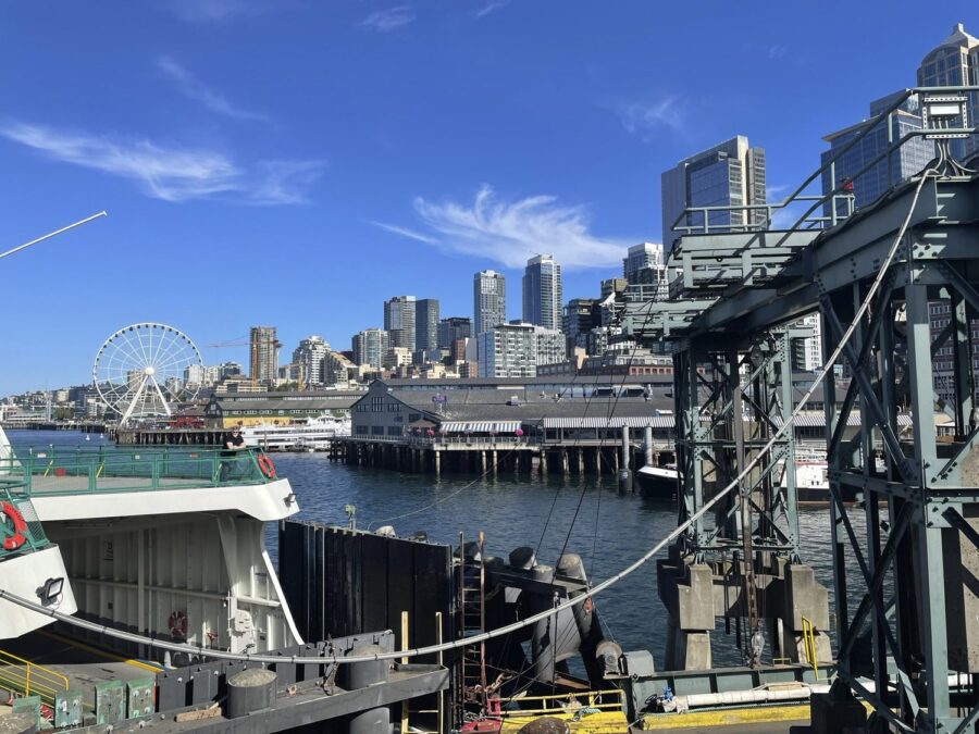 A view of a port from the perspective of a docked ferry.